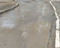 Здравствуйте! Прошу обратить внимание на состояние дорог и тротуаров в городе Остров-3 (квартал 3 Остров, г. Остров, Островский р-н, Псковская обл.) Дорога, в частности у дома №8, находится в очень плохом, ненадлежащем и разбитом состоянии. Сплошные глубокие ямы, колдобины. Дорога состоит из грязи, остатков щебня и крошек асфальта. Асфальтное покрытие практически полностью разрушено, что не соответствует нормам и создаёт угрозу водителям и пешеходам. Ямы просто невозможно объехать или обойти. Грейдер тут не поможет, он только усугубит ситуацию. Дорога не ремонтировалась несколько десятилетий. Летом, когда все лужи высохнут, у нашего дома сплошная пыль от проезжающих машин, которая поднимается на несколько метров.