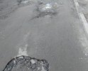 Разбитая дорога. Фото от 31.03.2021 г.