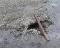 Во дворе дома Щигровский переулок 12 не возможно не ездить , не ходить. Ямы, машины на газонах. В ямы проваливаются машины. Страшно детей выпускать. Когда асфальт положат у нас? Это прям перед подъездом 2.