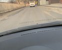 Дорога в отвратительном состоянии. Выполненный локальный ремонт ям( теперь бугры огромные) не изменил состояния дорожного полотна. Видимо дорожные строители не знакомы с технологией укладки асфальта и его выравнивания.