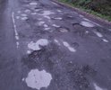 непригодное покрытие дороги от деревни Плесенское до СНТ Романтика