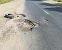 проезжая часть Зубчаниновское шоссе, 126д яма на половину проезжей части!!!! Обращение от 09.08.2021 в ДГХиЭ осталось без какой - либо ответной реакции!