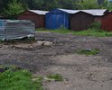 Дорога у площадки ТКО и территория за самой площадкой. Пару десятков лет назад большое пространство перед площадкой ТКО (на первом фото) было асфальтировано. Асфальт со временем пришел в негодность, ремонтные работы на этом участке никогда не проводились, хотя это одна из дорог к 1 школе, к техникуму, проезжая часть и по совместительству подход к площадке ТКО. Недавно участок перед ТКО и за площадкой ТКО посыпали асфальтобетонным ломом, как временное решение. Просим организовать укладку асфальта на этой проезжей части, перед ТКО и убрать остатки асфальтобетоного лома за ТКО, асфальтировав пространство вокруг мусорной контейнерной площадки.