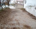 Пешеходная зона рядом с бывшем зданием гостиницы - очень оживлённый участок. Асфальт не менялся ни разу неверное с 70-80-ых.
Уложить плитку будет хорошим делом.