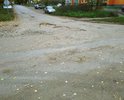 Разбитый участок дороги по ул. О.Кошевого от пересечения с улицей Фурманова до дома расположенного по адресу Фурманова 27а