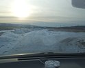 Улица не имеет покрытия асфальтового после дождей быстро разбивается что приводит к заболачиванию так как улица на болтистой почве. В 2021 году с моей поруки ОНФ адмнистрация частично отсыпала дамбу и немного улицу полотно дороги но не хватает на укладку плит. Плиты лучше всего так как будет быстрее и дешевле кроме того грунт смешанный население неоднократно ее засыпало тем что было под рукой. Но в основном песок и гравий. Красивое место примыкает к региональной трассе могут заезжать туристы. Перексток сделан с регионалкой. Нет знака уступи дорогу. Ямы ухабы черновой вариант на что хватило средств.