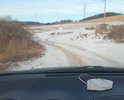 Необходимо сделать отворот на огороды и стрельбище. Улица идет в гору, ливневка нужна. Имеет смысл сделать ее бетонными плитами. Не делалась никогда. Рытвины, ухабы, ямы.