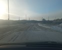 Муниципальная дорога на общественный полигон по накоплению мусора ТБО. ОТгрейдировано в 2021 году нет покрытия. Грунт суглинок и глина. ПОэтому дорогу быстро разбивает появляются ямы и непролазная грязь. Целессобразно покрыть бетонными плитами и не тратить бюджет много раз на ремонт постоянный. Знаков нет. Проходит через лесной массив. Используется общественным транспортом по вывозу мусора. Ямы есть и рельеф идет вдоль горок. Невыровнена. Необходима местами ливневка. Обочины сделаны но их быстро заполняет водой. Ширина около 2, 5 метров.