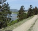 Часть первая. Дорога в деревню Бурдуково по берегу реки Селенга очень узкая требует в 3 местах отсыпки так как размыло половодьем наиболее короткий участок к Административному центру МО Итанцинское. Есть еще объездная дорога по реке Большой Уналей, но там дороги нет вообще. Дорога без покрытия уместно будет укласть бетонными плитами и делать частями. Отсыпать можно грунтом с региональной трассы подлежащей к ремонту Турунтаево-Шергино или с ближайшего карьера. Грунт песок, скальные породы местами, камень, суглинок. Покрытия не было никогда. Старая дорога с царских времен делается редко. Необходимо привести в порядок. На карте нет просто. Жители пользуются постоянно. Привлекательна для туристов.