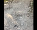 Дорога вокруг дома ул. Набережная 6 в пгт. Приморский в очень плохом состоянии. По ней ездит Скорая. А со двора ещё хуже, заложена кирпичами, перекопана водоканалом.
