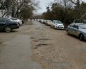Дорога вокруг дома ул. Набережная 6 в пгт. Приморский в очень плохом состоянии. По ней ездит Скорая. А со двора ещё хуже, заложена кирпичами, перекопана водоканалом.