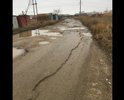Дорога вся в ямах, после дождя большие лужи. В районе школы №11 г. Феодосия, пгт. Приморский и гаражных кооперативов «Космос - Прим» и «Прибой».