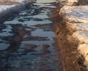 Дорога с большими ямами, без покрытия, сплошная грязь