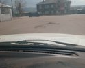 Дефект покрытия асфальтового. Асфальт уложен недавно по результатам отметки на карте убитые дороги. Продавливание верхнего слоя, вспучивание, образовалась яма. Растрескивание асфальта. Главная площадь села Турунтаево. Некачественно была сделана дорога. Рядом магазин хозтоваров, дом быта, памятник воинам, сельская администрация, ФСБ и прокуратура, апетки, и здание суда. Необходим ямочный ремонт.