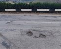 Несколько ям около заправки верхний "Атан". Вот так мы встречаем при въезде в город.