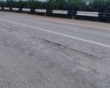 Несколько ям около заправки верхний "Атан". Вот так мы встречаем при въезде в город.