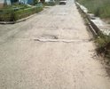 с. Турунтаево, 16-й квартал.
Ремонта наверное с момента постройки дома небыло, асфальт выкрошился, машины прыгают по дренажным каналам.
Требуется капремонт.