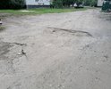 Многочисленные большие, глубокие ямы. Разбита дорога вдоль всего двора по ул.Северная6А г.Невинномысск.