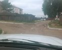 Внутри дворовых проездов в 1 квартале село турунтаево провалилась проезжая часть. Очень тонкий слой асфальта. На фото видно. Так как сверху течет дождевая вода в случае если ее не заделать там может образоваться рытвина и размыть оставшуюся проезжую часть так как наклон по данному перекрестку около 20 градусов. Яма глубиной около 40 см. Необходим ямочный ремонт. Возможно продавили крупные авто грузовые. Необходимо установить есть ли под проезжей частью канализация возможно она раздавлена. Проезд затруднительный.