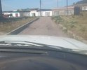 ямы с образующейся колеей из-за тонкого слоя асфальта ширина асфальта от силы 5 см. Ямы создают проблемы для движения авто. по обоим сторонам колес объехать там нет возможности все загорожено бордюрами. образовались с 2017 года. Необходим ямочным ремонт.