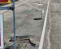 Сделали новый тротуар и асфальт, но почему те кто делали ремонт, забыли про коммуникации под асфальтом?  Из-за чего произошел обвал и дыры на дороге.