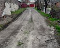 Выезд от гаражей происходит на ул. Николая Островского, г.Сальск. Большие ямы, при проезде машины цепляют днищем. Необходимо провести грейдирование.