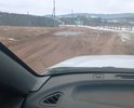 Участок требует отсыпки и грейдирования и подготовки под укладку асфальтом. Грунтовая дорога. Образовалась ямина и колея так как объехать сложно. Для машин с низкой посадкой после дождя и весной сложный проезд. Грейдировка не дает результатов под дорожным полотном глиняная линза. Требуется дробленка машина.
