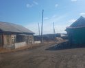 Жители требуют уложить асфальт. Улица грунтовая в центре поселения находится.Дорога отсыпана острым камнем грозящим проколоть колеса авто. Ямы. Грязь. В конце улицы не предусмотрен разворот для коммунальной техники. Неровности. Отсыпка была давно. Грейдер из-за узости не может попасть. Грейдировка возможна только фронтальным погрузчиком. Грунт смешанный камень и шлак, местами песок. Проходит по бывшему руслу ручья. Данную улицу я уже ставил на сайт но ее удалили прошу разобраться кто удалил и почему? В результате мне снова приходится начинать с начала. Не создавайте ни кому не нужной работы пожалуйста. Или если у меня пытались снять таким образом баллы или замолчать проблемы поселения тогда наверное по айпи-адресу будет понятно кому это было надо. Улицу видно хорошо, что требует ремонта. Асфальта не было.