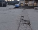 Ужасные ямы прямо в центре села возле автомобильной остановки