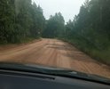 Грунтовая дорога к д. Исток, д. Ярцы и Республиканскому детскому санаторию. Зона посещения туристов с выездом на Байкал. Движение интенсивное всегда.Грунт песок с суглинком. УКлон до Ярцев около 20 градусов. Водостоки требуются только на возвышенности. Проходит через ВЭЛ пересекает. Лесная дорога в Особой экономической Бакайльской зоне и экологической. ООПТ.Асфальта не было никогда. Весной и после дождей появляются значительные ямы и нарушения проезжей части в виде частых бугров. Что затрудняет движение и создает опасные случаи для движения авто.Основной источник доходов акцизы на ГСМ и НДС поэтому требуется заявка в региональный или федеральный бюджет на выделение средств. Своих средств не хватает. Дорожное основание соответствует требованиям о песчаных грунтовых дорогах. Затраты минимальные выравнивание и отсыпка ПГС и укладка асфальтом. Дорога так же выходит на смотровую площадку на Байкал и на автобусную остановку Байкальский бор. Възед на дорогу имет ямы и рпытвины появляющимися от стекающей воды необходим водоотвод и грунтовый фильтр стоков.