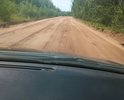 Грунтовая дорога к д. Исток, д. Ярцы и Республиканскому детскому санаторию. Зона посещения туристов с выездом на Байкал. Движение интенсивное всегда.Грунт песок с суглинком. УКлон до Ярцев около 20 градусов. Водостоки требуются только на возвышенности. Проходит через ВЭЛ пересекает. Лесная дорога в Особой экономической Байкальской зоне и экологической. ООПТ.Асфальта не было никогда. Весной и после дождей появляются значительные ямы и нарушения проезжей части в виде частых бугров. Что затрудняет движение и создает опасные случаи для движения авто.Основной источник доходов акцизы на ГСМ и НДС поэтому требуется заявка в региональный или федеральный бюджет на выделение средств. Своих средств не хватает. Дорожное основание соответствует требованиям о песчаных грунтовых дорогах. Затраты минимальные выравнивание и отсыпка ПГС и укладка асфальтом. Дорога так же выходит на смотровую площадку на Байкал и на автобусную остановку Байкальский бор. Въезд на дорогу имет ямы и рытвины появляющимися от стекающей воды необходим водоотвод и грунтовый фильтр стоков. Так же в период интенсивного движения образуется дорожная рябь препятсвующая нормальному движению машин ( стиральная доска).
