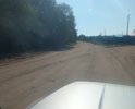 Сквозной проезд на улицу Кирова в с. Турка. Ямины, рытвины, грунт песок и супесь. Зимой нет возможности проехать из-за снега 1, 5 метра. Горные сточные воды стекают размывают постоянно. Необходимо выровнять и отсыпать дробленкой. Целесообразна холодная асфальтовая мастика в связи с экологическими требованиями санитарной зоны вокруг Байкала. Проезд ведет к гостевым домикам и жилым домам. Нет водостока. Ведет на набережную. Необходима грейдировка. Асфальта не было никогда. Нет пешеходной зоны. Турка туристическая основная зона и дорогами пользуется много туристов на авто. Проезд расположен в старом горном распадке часто весной талые воды размывают проезд. Ведет к старому мосту с разрушенным настилом. Так же размещаются промбазы и завод по изготовлению бутилированной воды.