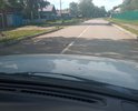 Начало разрушение дорожного полотна яма глубиной около 7 см. Ширина 6 см длинна 10 см. По центру дороги.