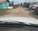 Улица Коммунальная яма на дороге требуется грейдировка. Яма грунтовая около 7 см в глубину в самой низменной части. Грейдировка не потребует отсыпки. Необходимо срезать просто ножом возвышенности. При невозможности пройти грейдером делается фронтальным погрузчиком. Фронтальные погрузчики в поселении имеются.