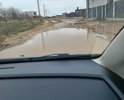 Добрый день! Дорога по этой улице как токавая отсутствует. Просто земля. Но, было все не плохо, если бы по этой дороге не ездило очень много строительной техники для строительства Психодеспансера. Просим вас, хотя бы отсыпать данную дорогу щебнем или другим материалом. Лужи и грязь - это не красит наш светлый и красивый город!
