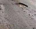ДОбрый день,
86 км Киевского шоссе из Москвы в Калугу, большая  яма прям по центру дороги. Яма перед светофором перед заправкой Лукойл.