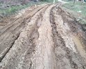 Проехать по  улице стало невозможно даже на джипе. Колеи в глубину почти в полметра.
