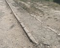 Добрый день. Хотел обратиться к вам. В городе Феодосия практически невозможно проехать к дому, по следующему адресу: г. Феодосия, ул. Челнокова, дом 78. В виду отсутствия какого-либо дорожного покрытия. Несколько лет назад, дорогу там укладывали. Но конкретно до 78 дома, она не дошла. Уже к повороту можно наблюдать неприятную картину. Для того чтобы вы могли объективно оценить ситуацию, прилагаю ещё фото изображение.
Место для пешехода абсолютно отсутствует, гражданам приходится идти вдоль дороги.
На мой субъективный взгляд, местная парковка находится слишком близко в детской площадке, что может повлечь за собой неблагоприятные последствия для здоровья детей.