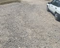 Добрый день. Хотел обратиться к вам. В городе Феодосия практически невозможно проехать к дому, по следующему адресу: г. Феодосия, ул. Челнокова, дом 78. В виду отсутствия какого-либо дорожного покрытия. Несколько лет назад, дорогу там укладывали. Но конкретно до 78 дома, она не дошла. Уже к повороту можно наблюдать неприятную картину. Для того чтобы вы могли объективно оценить ситуацию, прилагаю ещё фото изображение.
Место для пешехода абсолютно отсутствует, гражданам приходится идти вдоль дороги.
На мой субъективный взгляд, местная парковка находится слишком близко в детской площадке, что может повлечь за собой неблагоприятные последствия для здоровья детей.