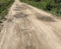 Дорога не ремонтировалась более 10лет, имеет повреждения, ограничивающие скорость транспортного потока в пределах допустимой нормы. В весенний, летний и осенний периоды ямы заполняются водой, создавая невозможность прохода пешеходов и проезда по дороге. Качество дороги не соответствует ГОСТам.