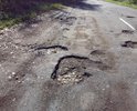за 2024 год даже не одной ямы не заделали. Машины постоянно улетают в обочину .Дорого просто убита, десятки лет без ремонта . На асфальт насыпан песок не ямки залатать не отгрейдировать