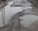 Проехать проблематично, лужи по самые двери.