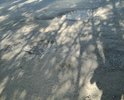 Ямы создают аварийную обстановку на дороге.