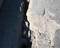 Из за разбитой боковой части дороги движение затруднено,полотно узкое.При встречном транспорте приходится проезжать по очереди.В темное время суток этих ям не видно
