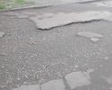 На улице Крыловская 21/1, 21/2 многочисленные ямы, по которым можно проехать только на автомобиле с высокими клиренсом, эта дорога никогда не ремонтировалась.