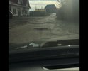 Ужасные ямы при въезде на улицу кронштадтскую рядом находятся магазины и Водоканал.