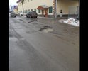 Ул. Мало-Тобольская, вся в ямах, проезжают большегрузы, разбивая остатки дороги, отсутствует дренаж, вода стоит на всей улице.