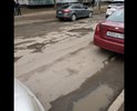 Глубокие ямы на тротуаре и проезжей части на улице Киселева у музыкальной школы и 23-й школы.