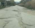 По этой улице раньше ходили автобусы трёх маршрутов (2,2а,13). Теперь и асфальт вообще исчезает. Ремонт не делали более 20 лет. Название улицы просто «в точку».