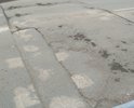 Ул.Волгоградская д.41 напротив,
 на дороге искусственная неровность в плохом состоянии. "Лежачий полицейский"